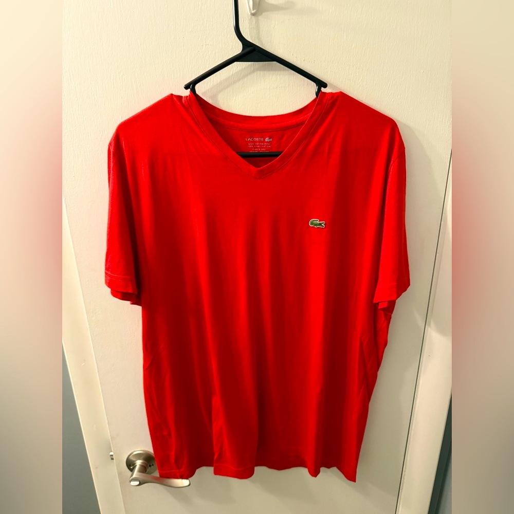Lacoste v-neck 
Sz L
Excellent condition 
Smoke free house
